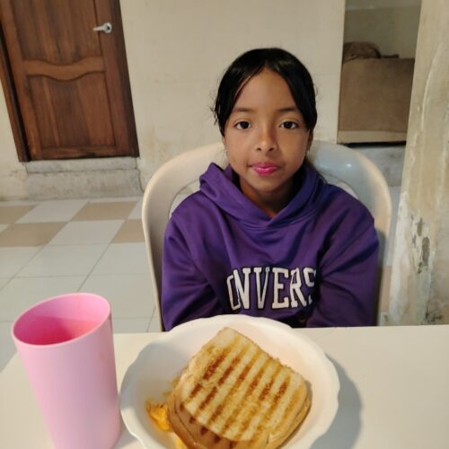 girl eating sandwich